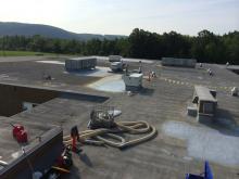 Always up for a road trip and something new and interesting, in the spring of 2013 DMT Foam was asked by our vendor Gaco Western if we might be interested in a little roof repair job nestled in the foothills of the Adirondacks.  A roofing foam project had gone bad and we were tasked with repairing the exsiting spray foamed roof.  Originally slated to repair some delaminated foam we ended up completely tearing off sections of the roof to the metal deck. 